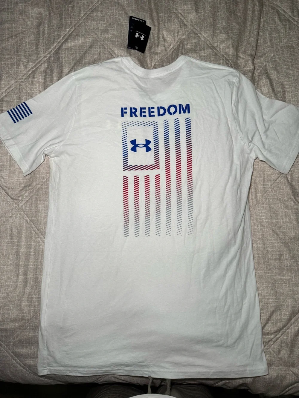 Under Armour White Short Sleeve Freedom Performance Tee with Blue Logo